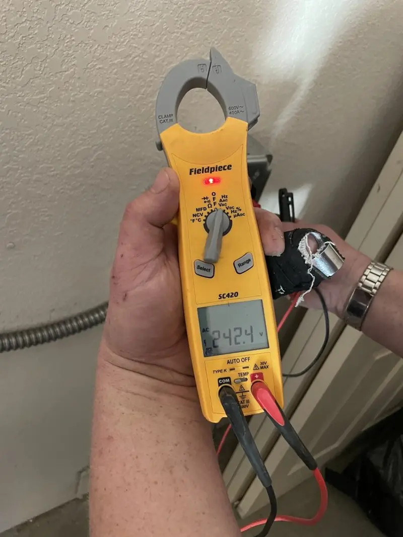 Voltage testing with clamp meter during Hot Tub / Pool Electrical Wiring in Lewiston